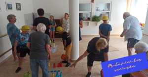 Fotografie předávání her seniorům 